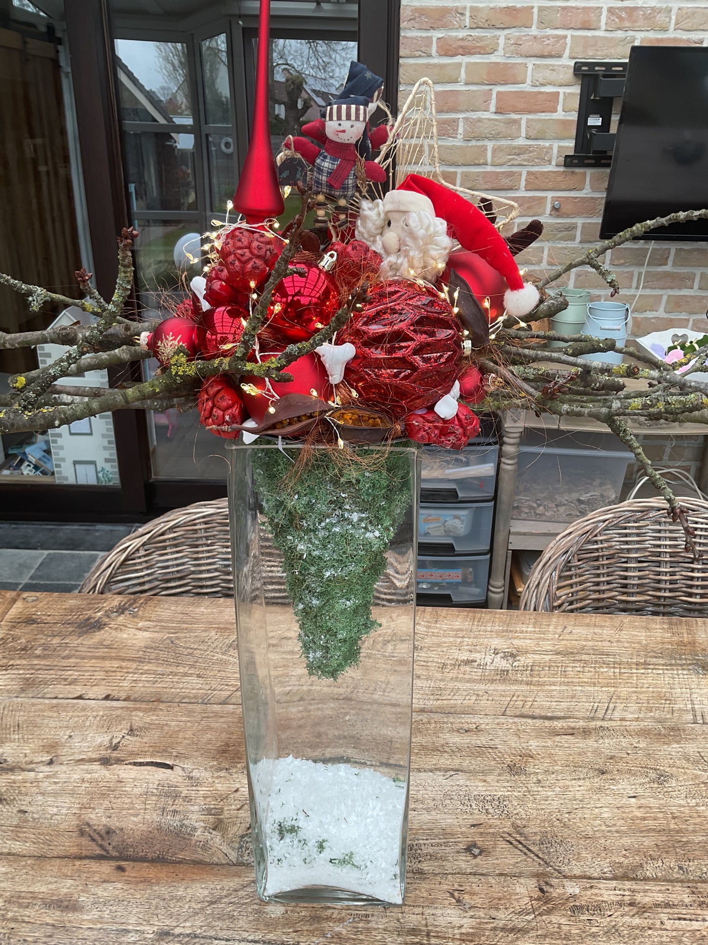 Kerststuk op een vaas