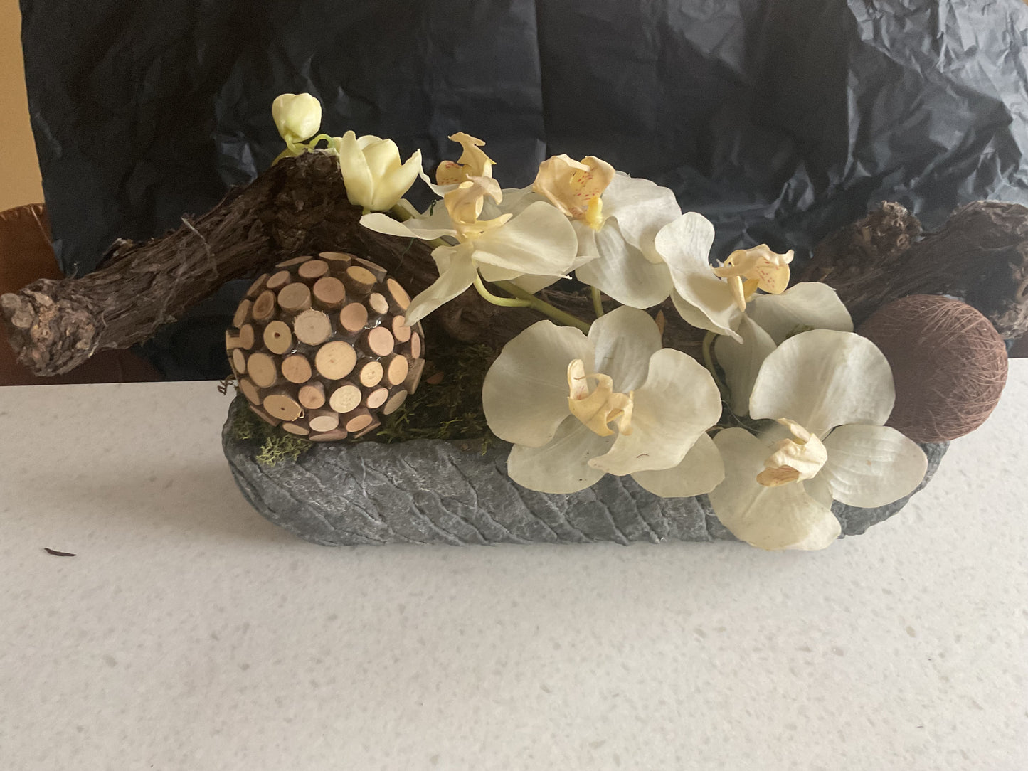 Orchidee op druiventak