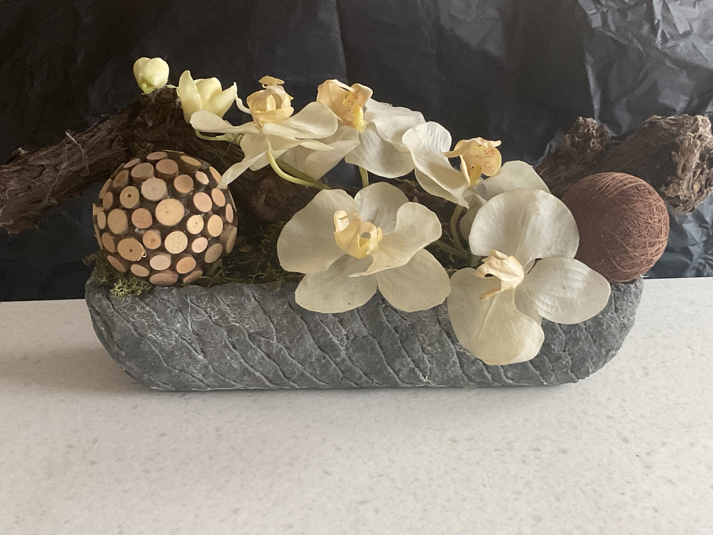 Orchidee op druiventak